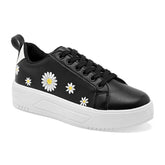 Tenis urbano para mujer color negro con estampado de flores marca Moramora